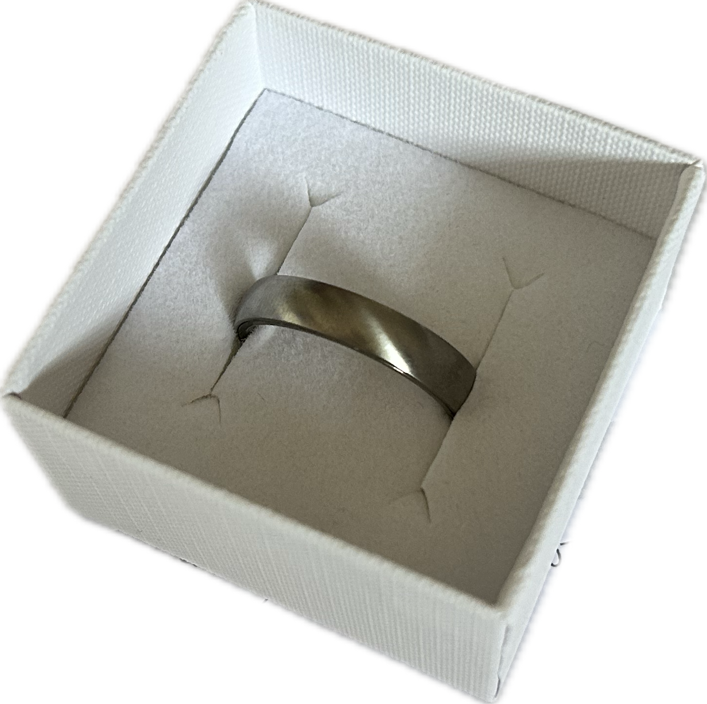 grey ashes plain satin dome ring in a white box on a transparent background
