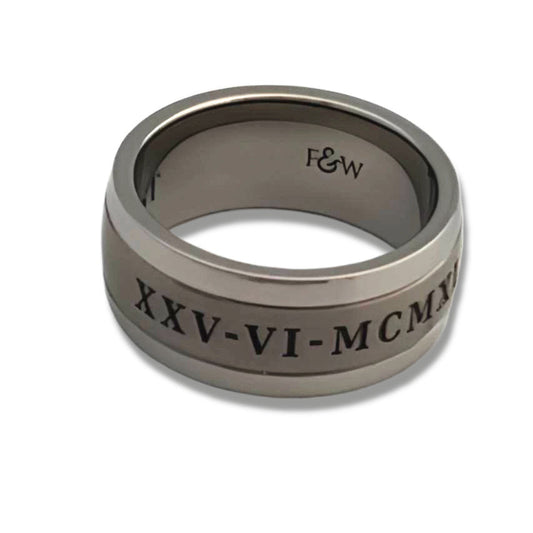 grey ashes ring band with silver edges and engraving on the outside of the ring  