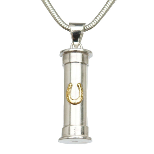 Silver cylindrical urn pendant with a gold shaped horseshoe on a silver snake chain on white background 