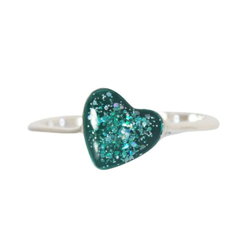 Silver ring with green glittery heart-shaped stone on a white background