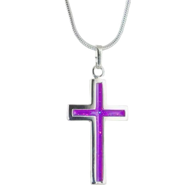 Silver cross pendant on snake chain with amethyst sparkling colour inlay on a white background
