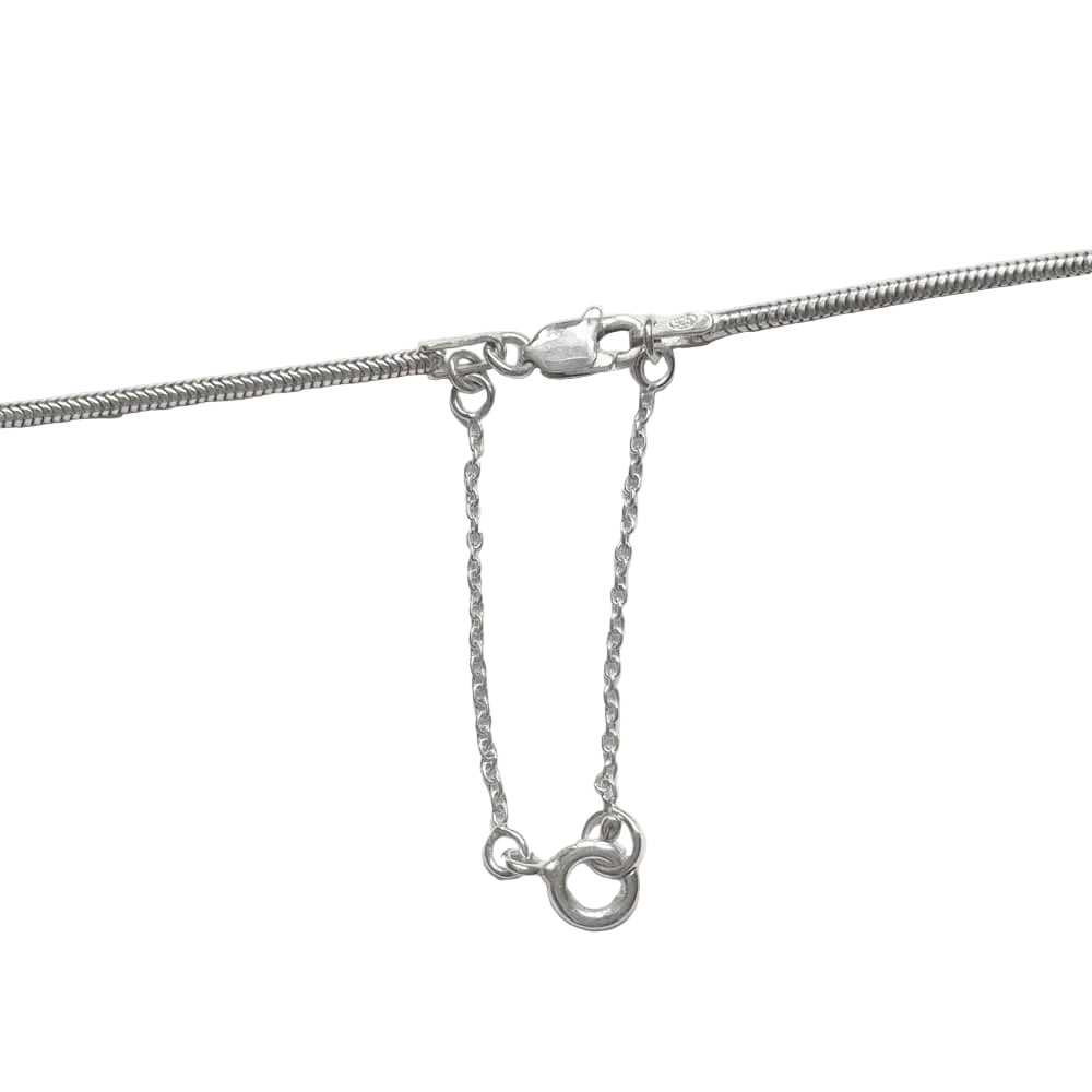Sterling silver snake chain with safety chain on a white background