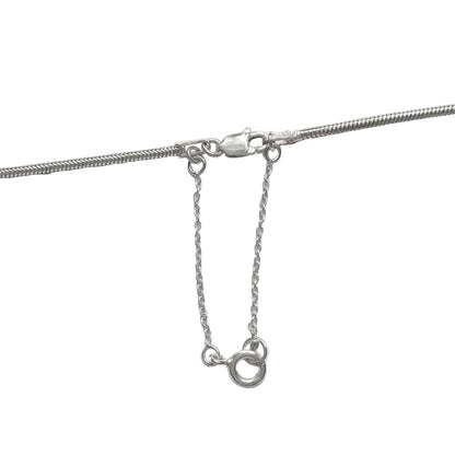 Sterling silver snake chain with safety chain on a white background