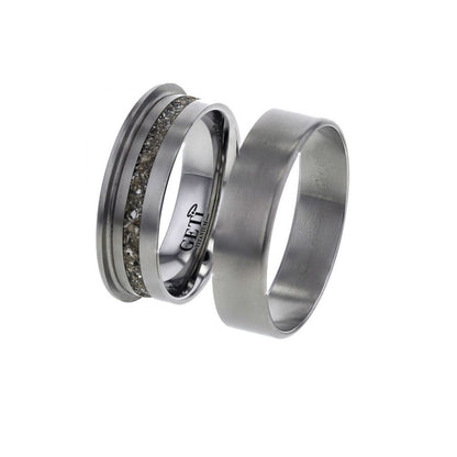 Cross section of flat shape ring showing where hidden ashes, hair or fur are held on a white background.