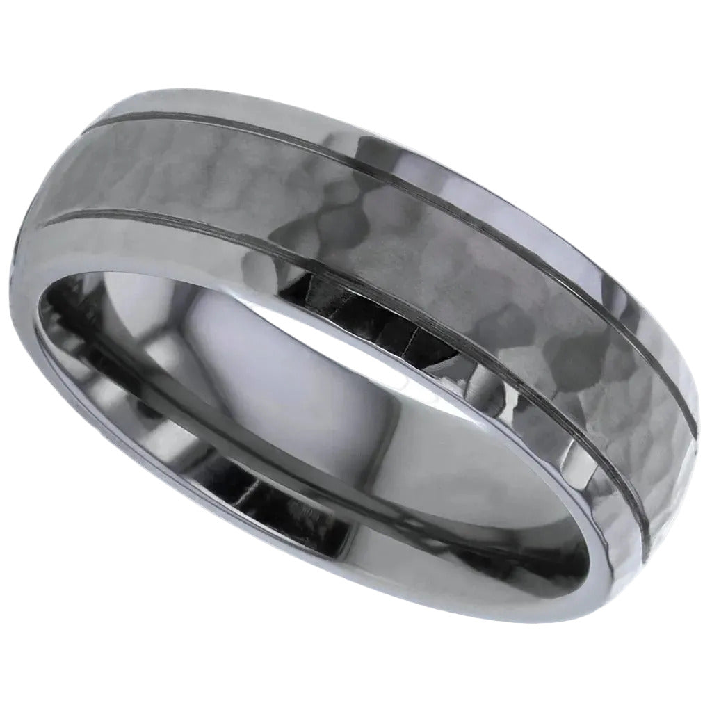 Silver and grey coloured dome ring with a textured finish on a white background